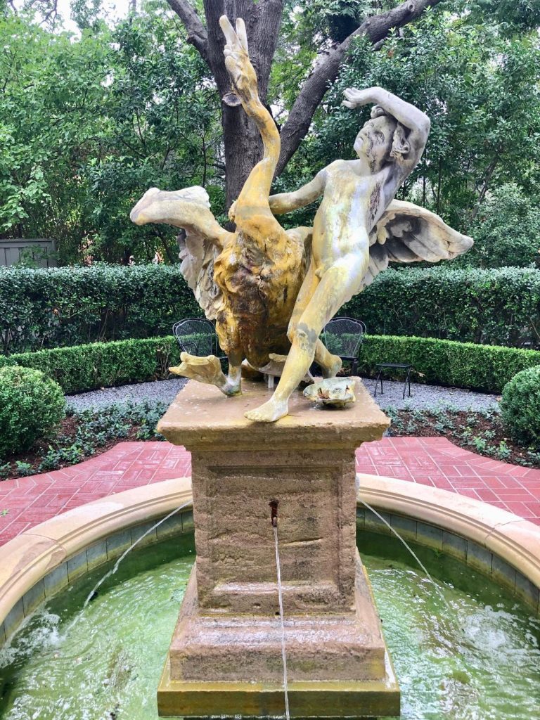 Formal parterre flower beds a and fountains await visitors on the Hidden Garden's Tour