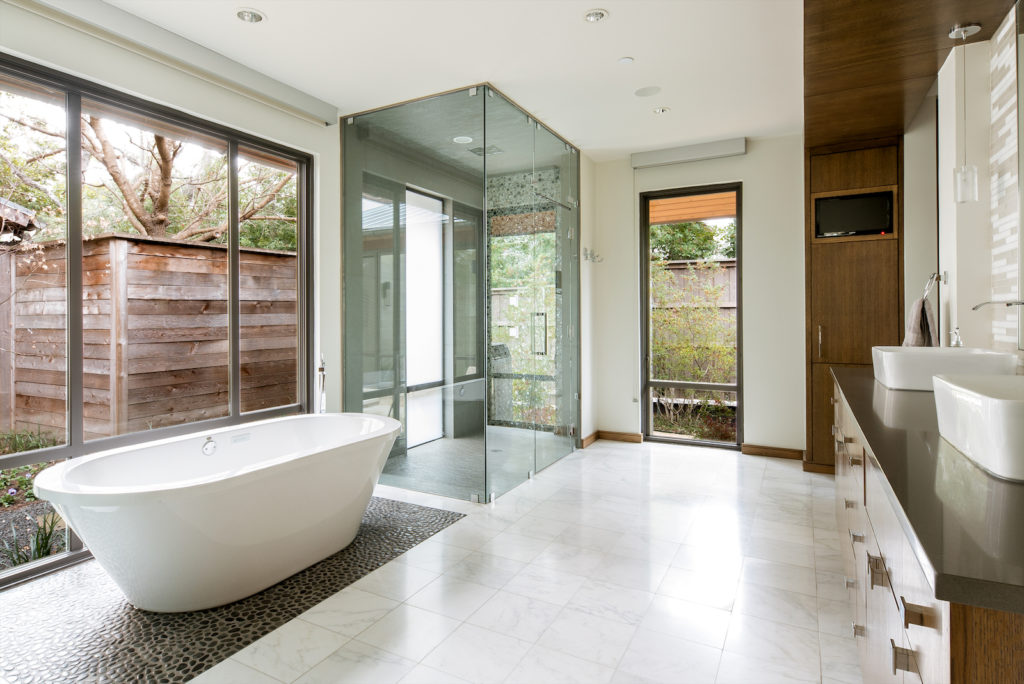 A separate wing includes the master bedroom and a spa-like bathroom.