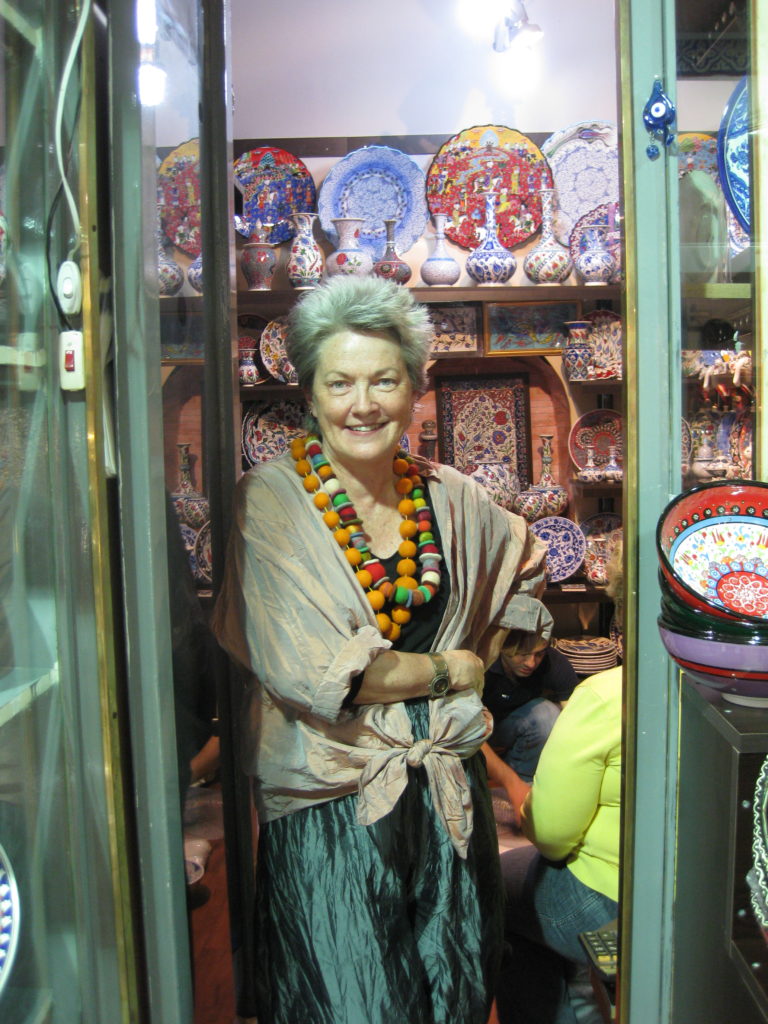 Artist Mary Margaret Hansen poses in the doorway of a shop in the Grand Bazaar, Istanbul, 2009.