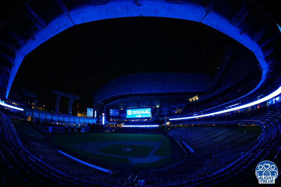 With baseball on hold, Minute Maid Park is dark except for the #lightitblue salute. 