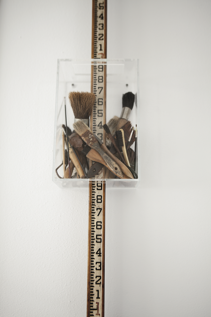 Claire Cusack, published September 2014. Photographed by Jenny Antill Clifton. In artist Claire Cusacks’ 1917 bungalow, the artist’s assemblage, "Paint by Numbers," 2013.