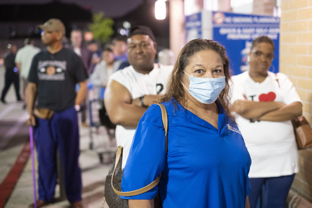 Customers wait for Wal-Mart to open its doors for an hour of seniors-only shopping. (Photo by F. Carter Smith)