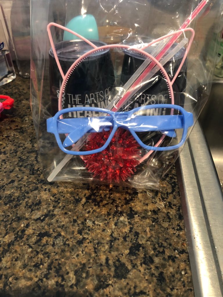 Party kits for the Sunshine Kids' virtual senior prom include '80s glasses, kitten ears, neon bracelets, tie dye t-shirts and more. 