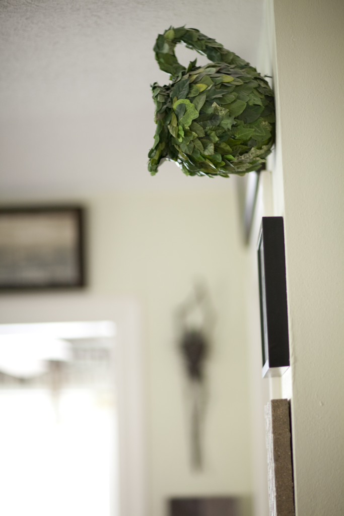 Kirk Baxter and David Waller, published May 2011. Photographed by Jenny Antill Clifton. Kirk Baxter and David Waller describe their collecting oeuvre as “rescuing wayward objects.” Photographed in their Montrose bungalow, Gary Retherford sculpture, 1990s.