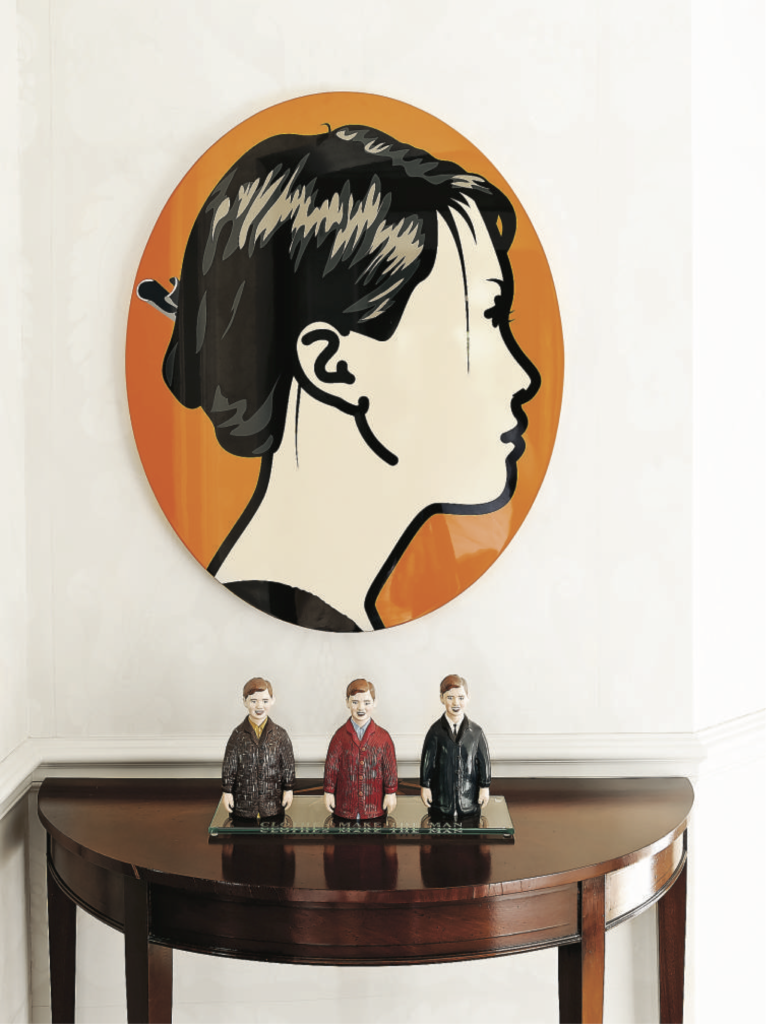 Leigh and Reggie Smith, published September 2011. Interior design Terry Prather. Photographed by Jack Thompson. In art collectors Leigh and Reggie Smith’s River Oaks home, Julian Opie oval orange portrait from Galerie Bon van Orsouw, Zurich. Laurie Simmons sculpture, "Clothes Make the Man"; starburst demi-lune table from Carl Moore Antiques. 