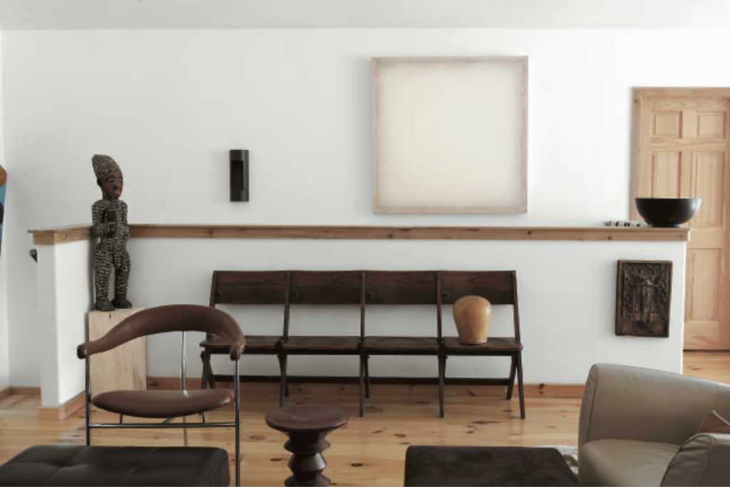 McKay Otto and Keith Coffee, published November 2011. Photographed by Jenny Antill Clifton. In artist McKay Otto and Keith Coffee’s Ever Land compound in Wimberley, an antique bench and hat-form from Martin Mercader Antiques in the Heights; McKay Otto painting,; and “Seashell Man,” found on 19th Street in the Heights