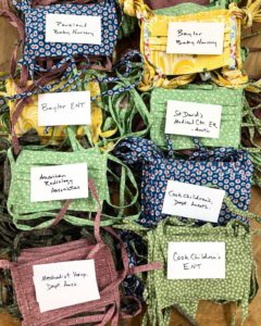 Masks, made by refugee artisans, headed to hospitals