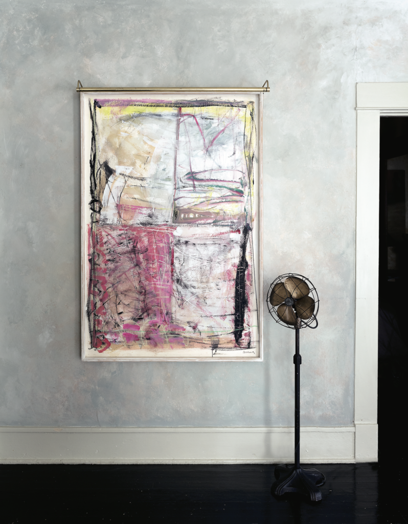 Rusty Arena, published October 2013. Photographed by Jack Thompson. In artist Rusty Arena’s 1910 historic Montrose home, tinted plaster walls, and Arena’s mixed media on paper, "Head Crush," 2007.