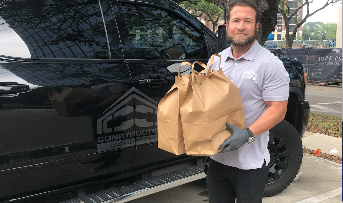 Construction Concepts CEO Joshua Weisman preparing food deliveries for families of children cancer patients.