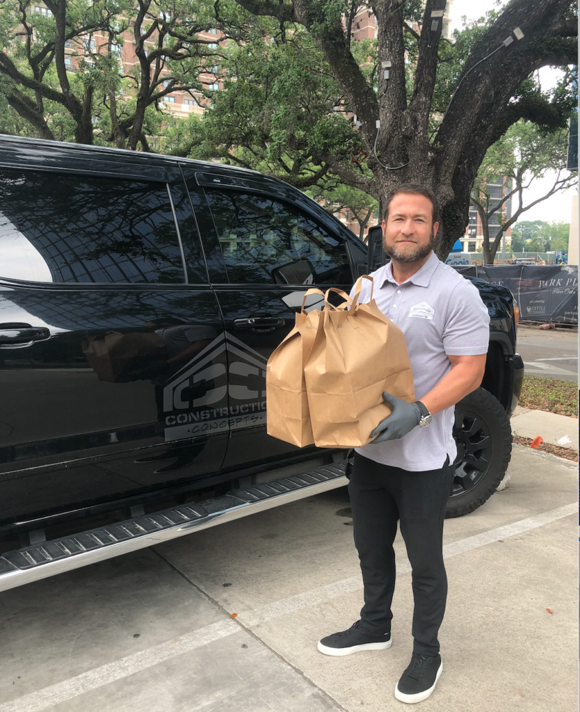 Construction Concepts CEO Joshua Weisman preparing food deliveries for families of children being treated for cancer in the Texas Medical Center.