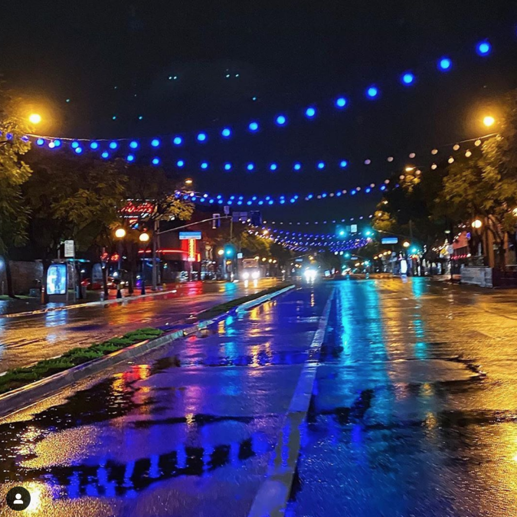 Santa Monica Boulevard where the rainbow lighting was changed out to blue in honor of health care workers, first responders and essential personnel on the front lines of the fight against COVIC-19. (Instagram photo @yogavibeweho)
