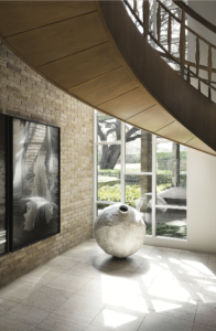 Sharon and Michael Young, published March 2017. Interior Design and Architectural Renovation Bodrun + Fruit. Photographed by Lisa Petrole. In art collectors Sharon and Michael Young’s 1961-era home in Dallas’s Preston Hollow, the magnolia-wood floating staircase is original to the house. Miroslaw Balka’s “Untitled,” 2001. Hanging, Paul McCarthy’s “White Line Painted on the Floor with my Face,” 1972.