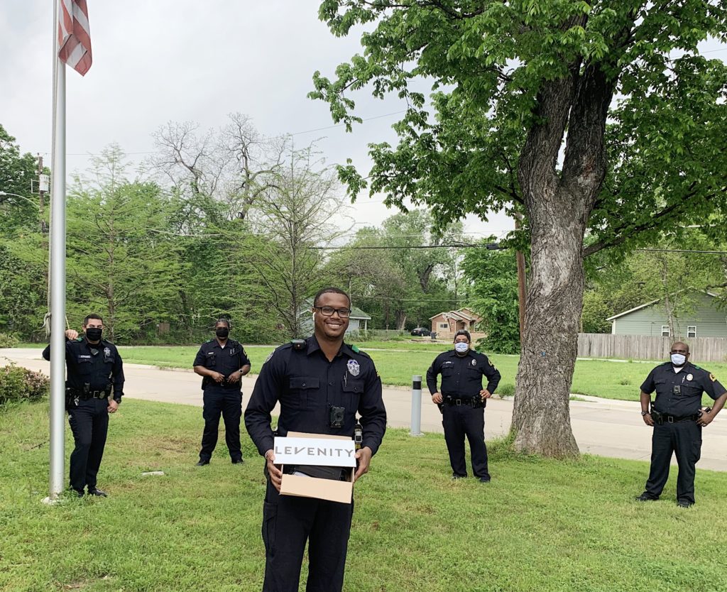 Officers from the Dallas Police Southeast Neighborhood Team wearing Levenity masks.