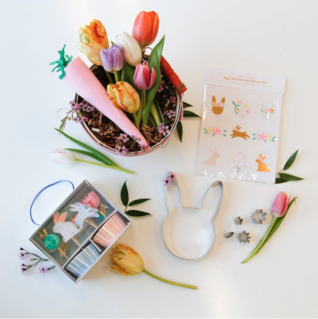 Dr Delphinium's Kids Basket comes with cookie cutters, a cupcake decorating kit, temporary egg tattoos, and more.