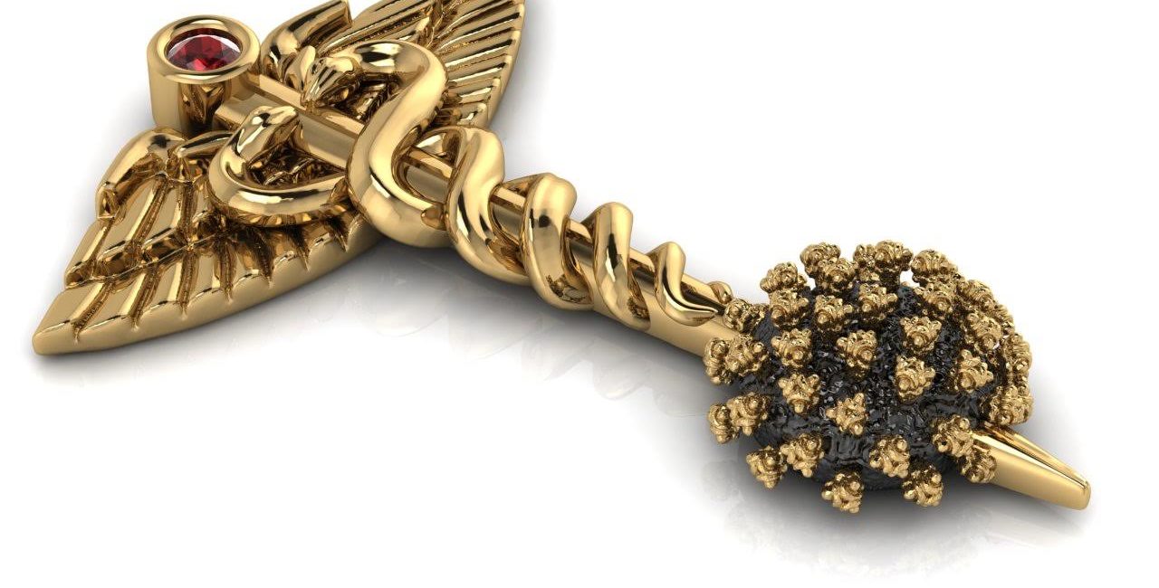 The ‘Defeating the Virus’ pin created by Franco Valobra of Valobra Master Jewelers in Houston and New Orleans.