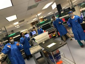 Lab technicians at Creative Test Solutions in Dallas wearing Levenity masks