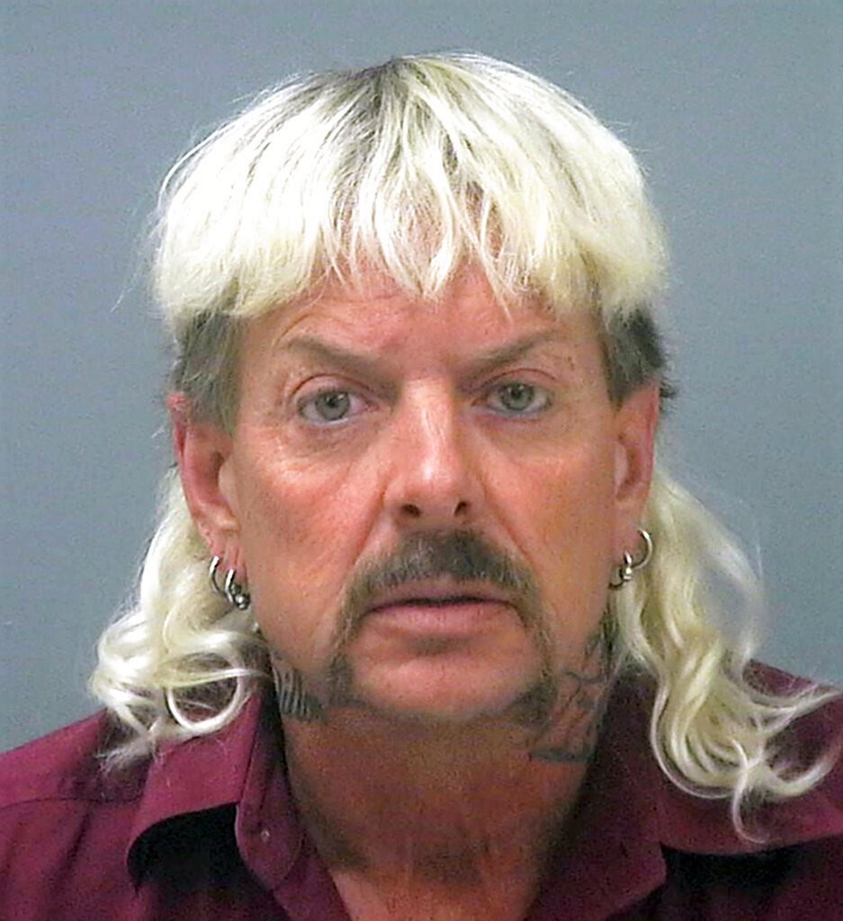 Joe Exotic (aka Tiger King) rocking the mullet in his mugshot.