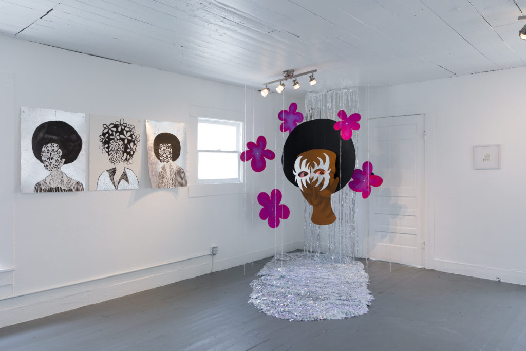 Jasmine Zelaya's "Sugar Water," installation at Project Row Houses focuses on the artist's interest in diversity and tropes of female beauty. (Photo by Alex Barber)