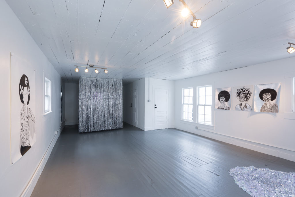 Sculptural components convey a stage set or disco space in Jasmine Zelaya's "Sugar Water," at Project Row Houses. (Photo by Alex Barber)
