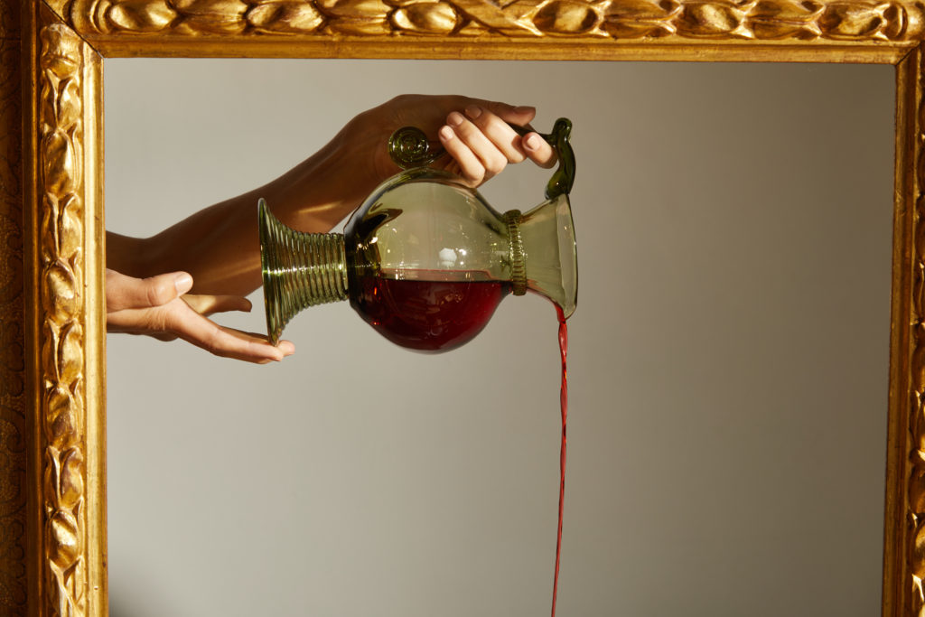 Historical green glass pitcher, $180