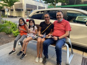 A family sets aside masks to enjoy ice cream from Amorino in River Oaks District. (Photo by Shelby Hodge)