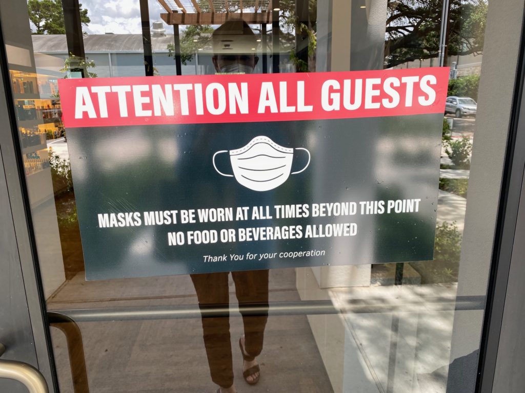 This sign of the times means business for clients at Therapy Hair Studio. (Photo by Shelby Hodge)