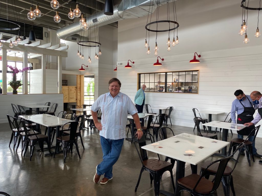 Restaurateur Bill Floyd is all smiles as his Porta ‘Vino reopens after being shuttered by the coronavirus mandate. (Photo by Shelby Hodge)