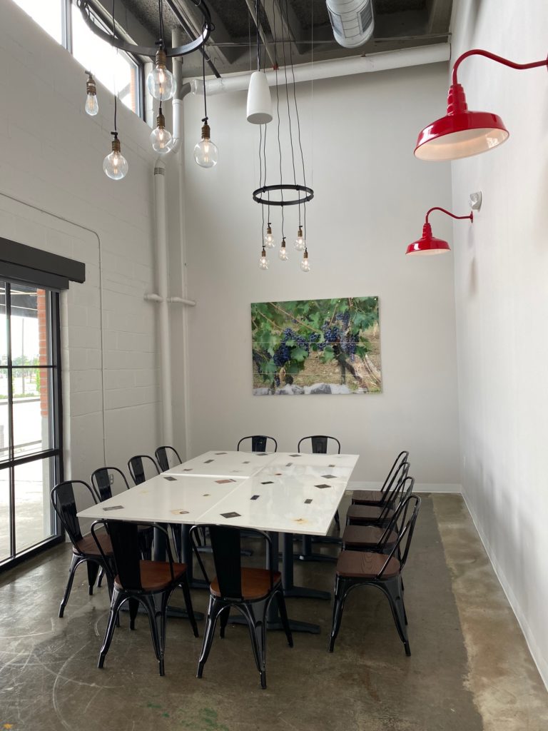 Porta'Vino has two private dining rooms each with a 70-inch screen TV for meetings and viewing sporting events. (Photo by Shelby Hodge)