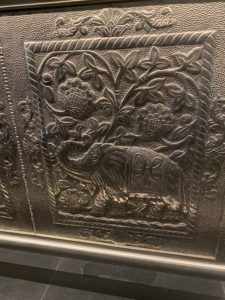 Musaafer detail of tin plates at the bar