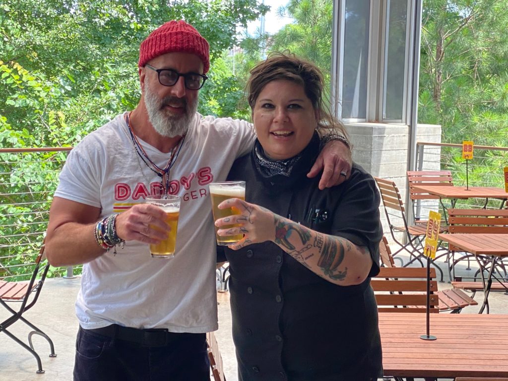Grant Cooper, Chef Jane Wild toast the opening of Daddy's Burgers pop-up at The Dunlavy. (Photo by Shelby Hodge)