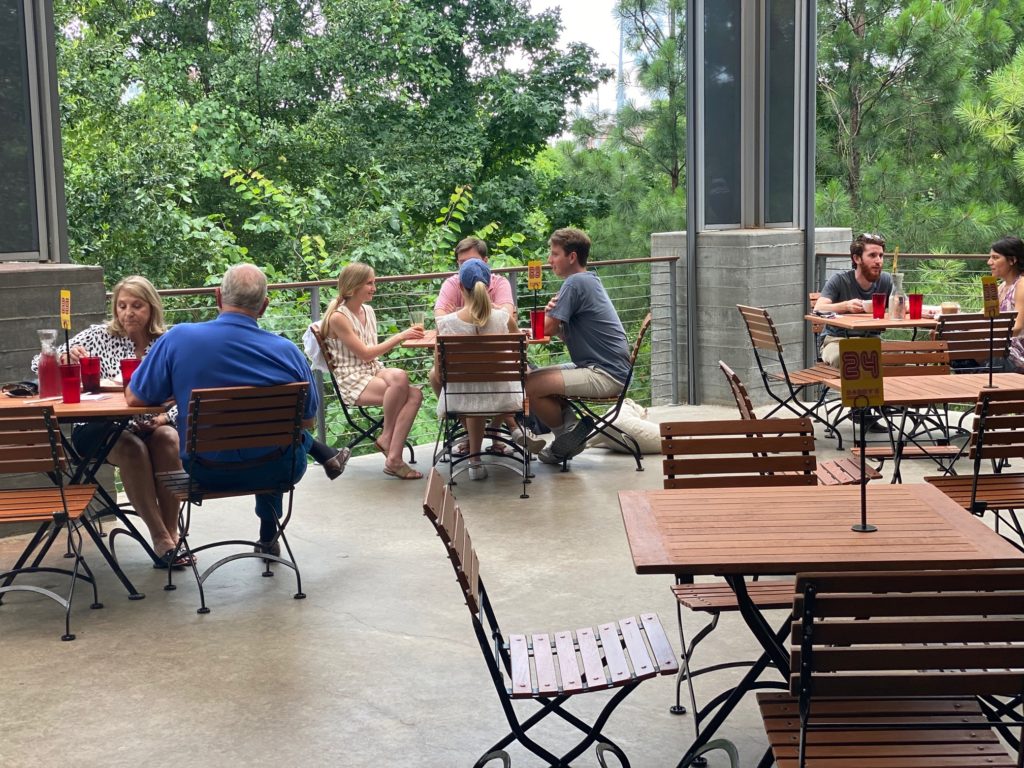 Daddy's Burgers guests dining on the patio at The Dunlavy.