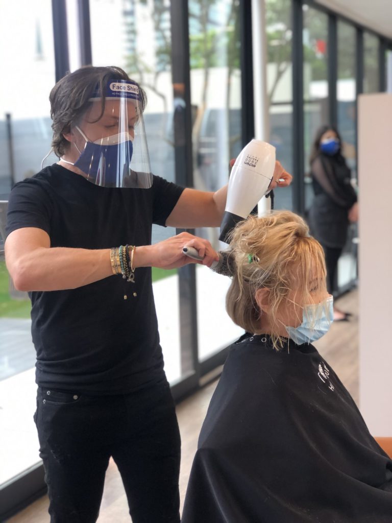 David Bamford with the new look of stylists at his Therapy Hair Salon.