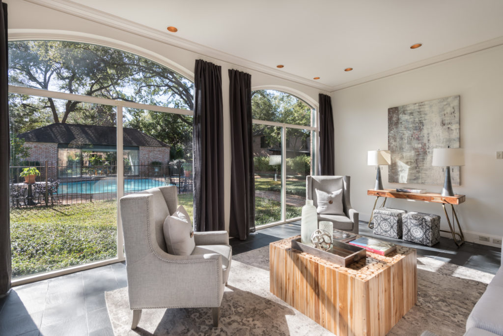 The sunroom is filled with light and offers expansive views of the garden. (Photo by Vlady Ambia)