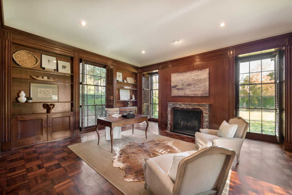The luxurious walnut-paneled library at 3015 Inwood in River Oaks, designed by John Staub. (Photo by Vlady Ambia)