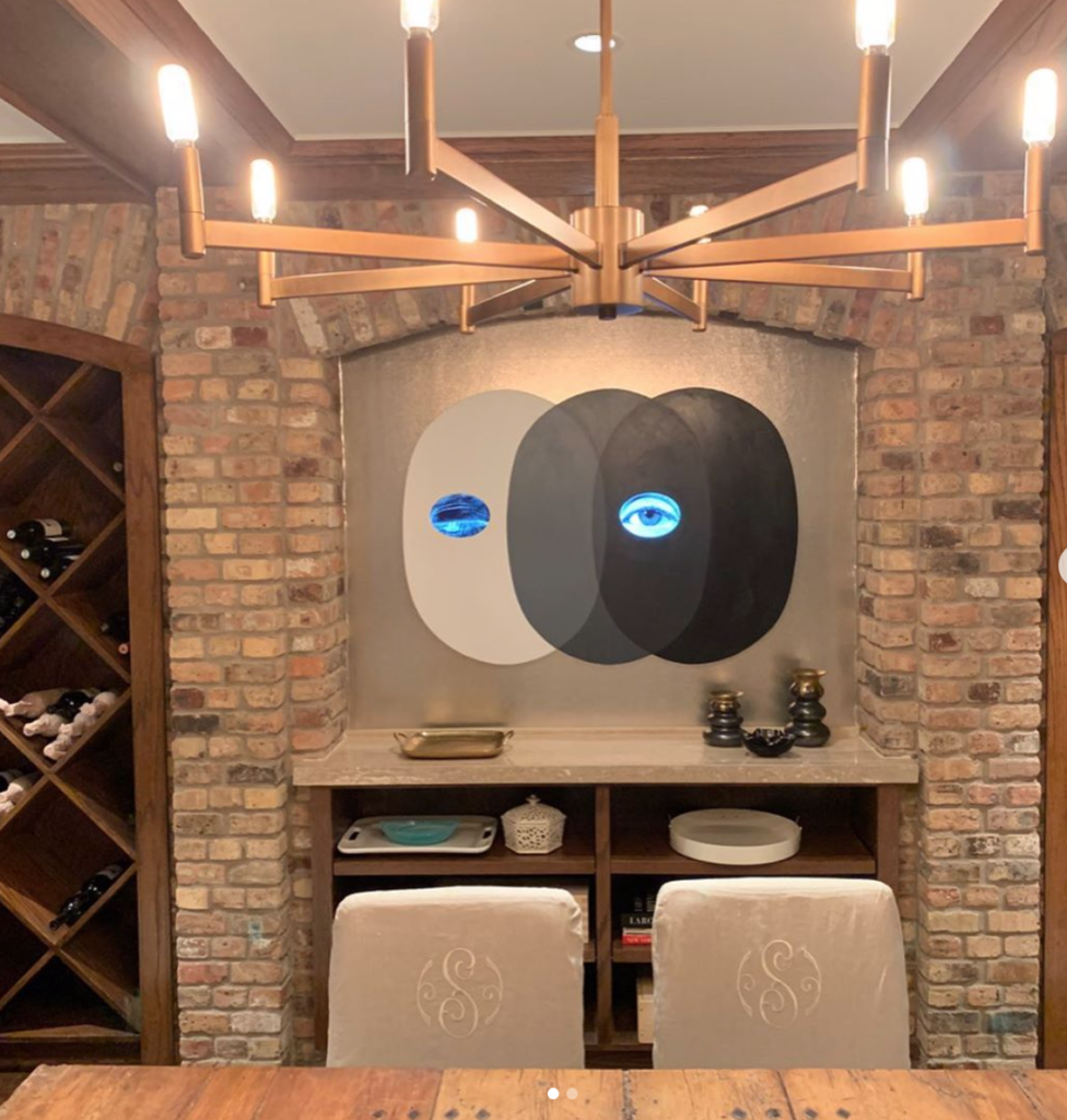 'Tony Oursler’s “Pro-Pro”, 2014, holds a place of pride in our basement wine room (and for some reason this area is seeing high traffic these days!),' Leigh Smith says. (Instagram Photo) 