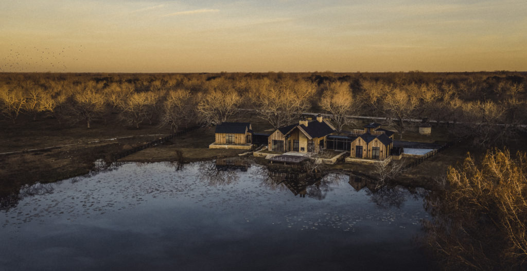 The first home to be built in the Orchards at Pecan Acres overlooks Lucille Lake.  (Photo by Kristian Alveo for Kebony)