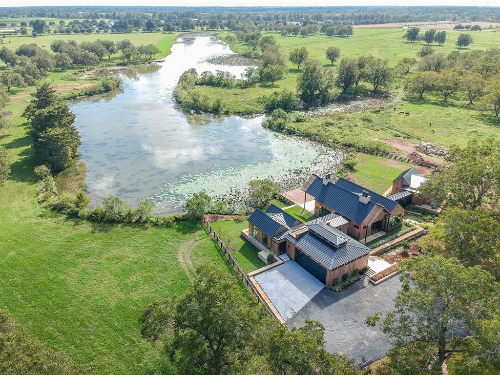 The first home in the Orchards at Pecan Acres overlooks Lake Lucille. (Photo by ProHouston)