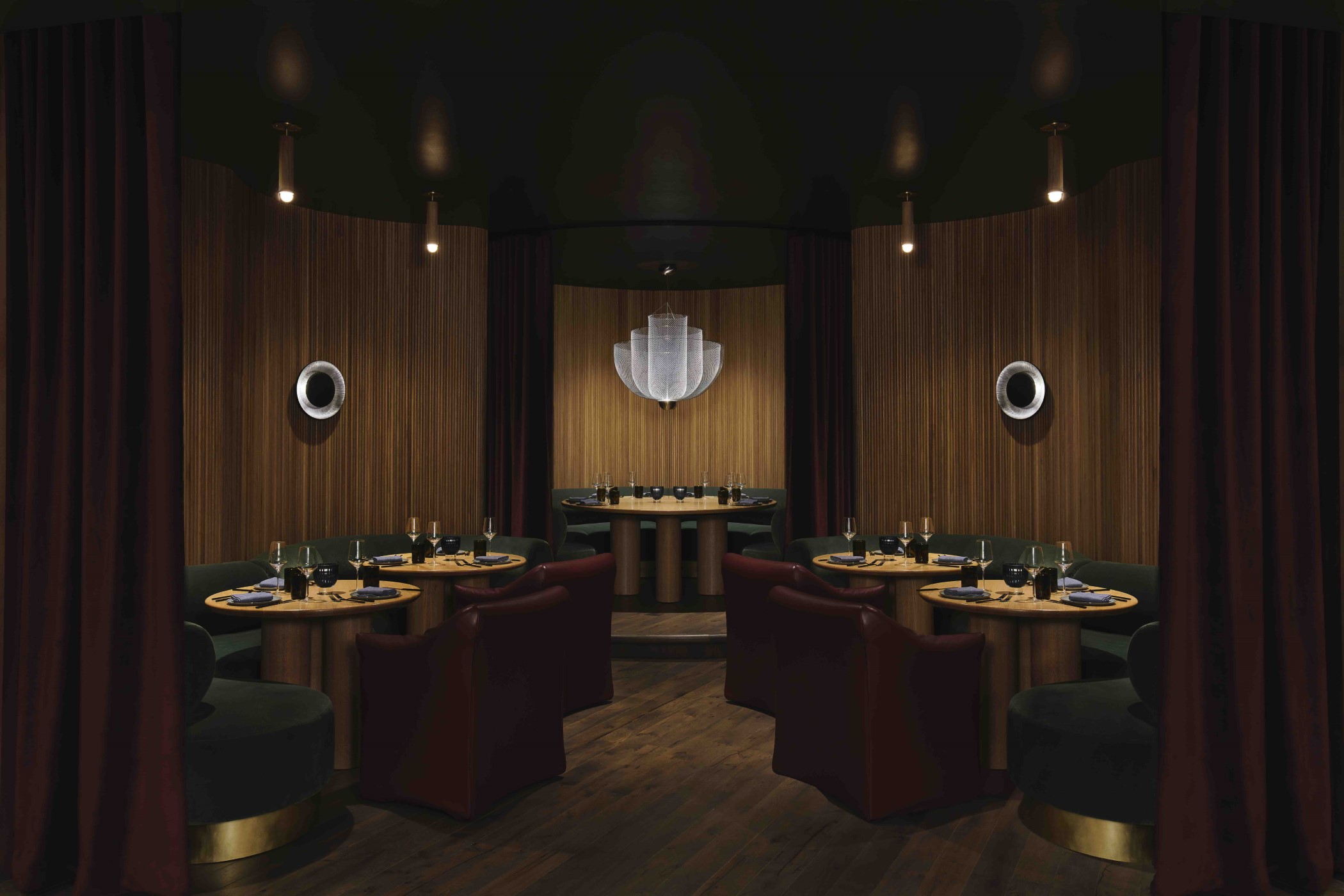 The Shag Room’s circular design — a mainstay of every Virgin Hotel property — presented aesthetic challenges for Mozersky that he solved with a serpentine ruched banquette. The Meshmatics chandelier designed by Rick Tegelaar for Moooi is through Scott + Cooner.