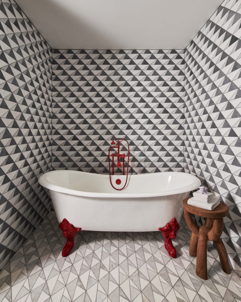 The bathroom in Richard’s Flat, designed Joel Mozersky, is a standout in Artistic Tile’s Sail tiles, which he says gives the space rhythm and pattern in an otherwise tiny area.