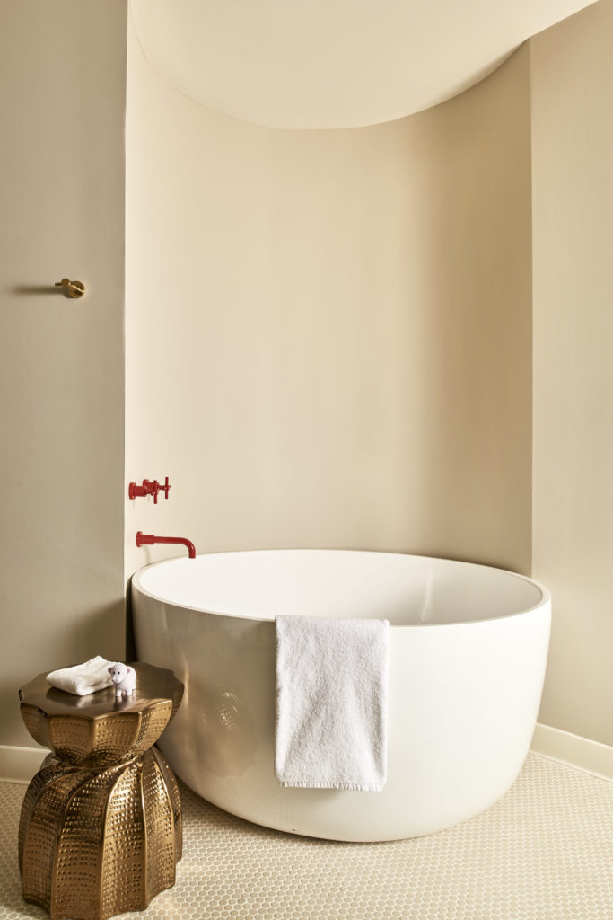 Circular tub in the Deluxe Chamber King Suite. 