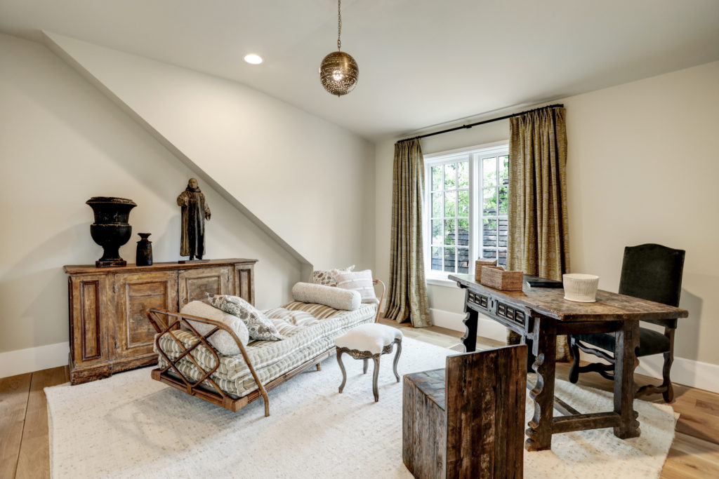 A secondary bedroom is designed by Jennifer Vaughn Miller.