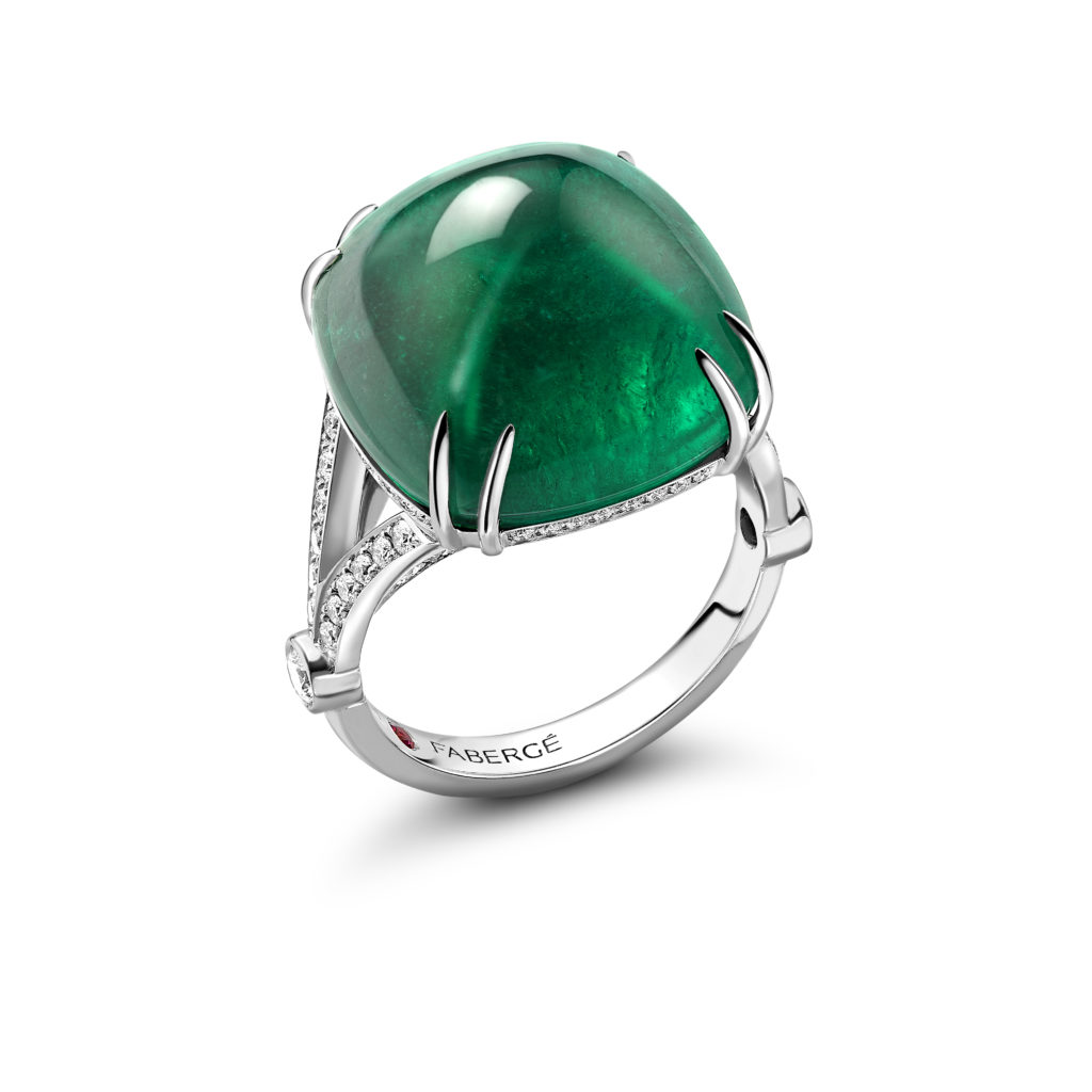 Faberge – The Fabergé Empress Emerald Ring is set in 18 karat white gold and adorned with a single sugarloaf Zambian emerald and 74 brilliant cut white diamonds.