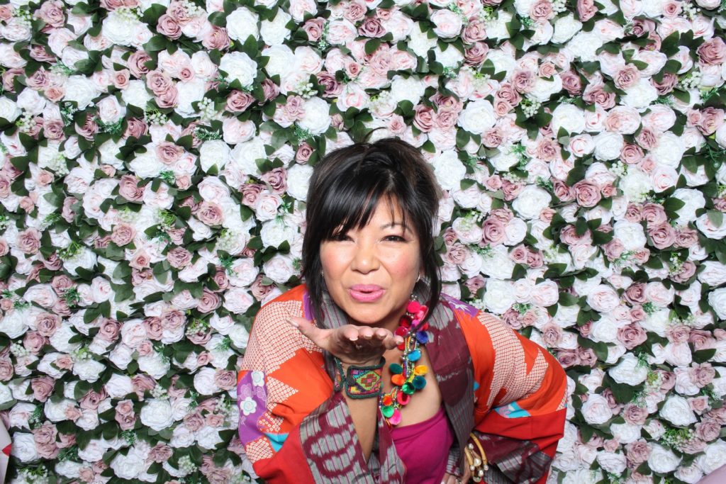 Tina Zulu of Kimono Zulu styling a colorful long-sleeve kimono