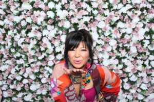 Tina Zulu of Kimono Zulu styling a colorful long-sleeve kimono