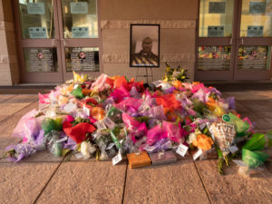 Houston Police officers salute the casket and family of George Floyd as they arrived for his funeral at the Fountain of Praise church