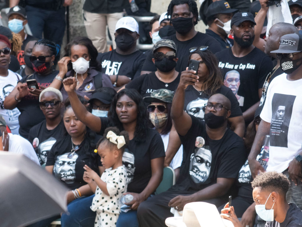 Sixteen members of the George Floyd family from Houston listened to remarks on stage after the Houston March For George Floyd ended up at Houston City Hall (Photo by F. Carter Smith)