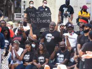 Sixteen members of the George Floyd family from Houston listened to remarked after the Houston March For George Floyd ended up at Houston City Hall