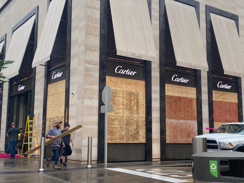 No one answers at Cartier, which was boarding up and closed for an undetermined length of time. (Photo by Shelby Hodge)