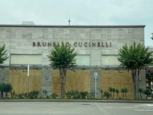 With merchandise removed from sight, Brunello Cucinelli in River Oaks District boards up. (Photo by Shelby Hodge)