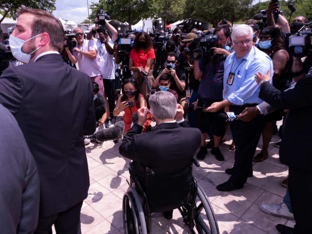 Texas governor Greg Abbott met the media outside The  Fountain of Praise church. (Photo by F. Carter Smith) 